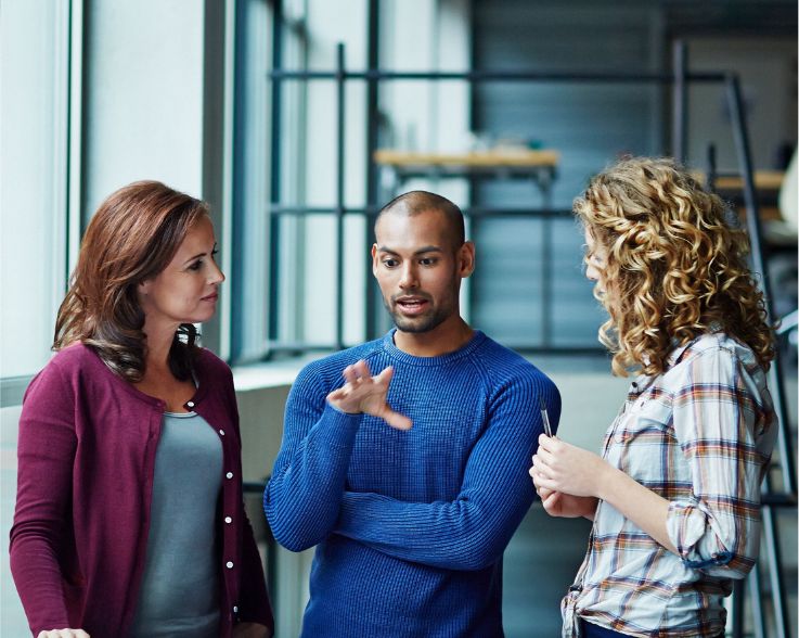 IBM Foto eines Finance Teams im Dialog